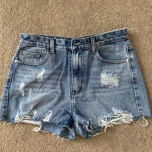 Medium wash lightly distressed denim shorts